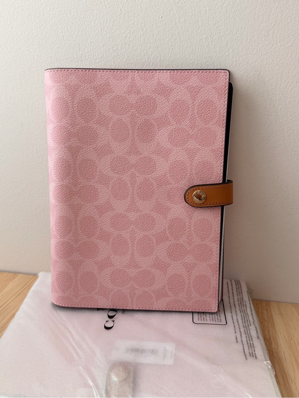 Coach Signature canvas powder pink notebook